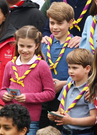 Britain's Prince George (C), Britain's Prince Louis (R) and Britain's Princess Charlotte (L) pose for a group picture with volunteers who are taking part in the Big Help Out, during a visit to the 3rd Upton Scouts Hut in Slough, west of London on May 8, 2023, where the family helped to renovate and improve the building. - People across Britain were on Monday asked to do their duty as the celebrations for King Charles III's coronation drew to a close with a massive volunteering drive.
The Big Help Out, 3rd Upton Scouts Hut, Slough, UK - 08 May 2023