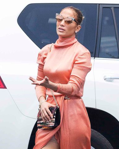 Jennifer Lopez spotted wearing Spanx as she attends her twins graduation and Alex Rodriguez and ex Marc Anthony in Miami. Lopez wore shape wear under a revealing salmon colored Chanel dress as she made her way to the graduation ceremony of Max and Emme.Pictured: Jennifer Lopez,Alex RodriguezRef: SPL5095986 050619 NON-EXCLUSIVEPicture by: SplashNews.comSplash News and PicturesLos Angeles: 310-821-2666New York: 212-619-2666London: 0207 644 7656Milan: 02 4399 8577photodesk@splashnews.comWorld Rights