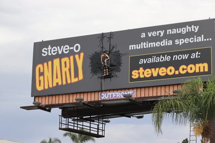 Steve O duct tapes himself to a billboard In Hollywood. 13 Aug 2020 Pictured: Steve O duct tapes himself to a billboard. Photo credit: Rachpoot/MEGA TheMegaAgency.com +1 888 505 6342 (Mega Agency TagID: MEGA694067_008.jpg) [Photo via Mega Agency]