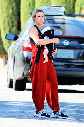 Studio City, CA  - *EXCLUSIVE*  - "RHOBH" star Teddi Jo Mellencamp carries her baby girl in a Baby Bjorn as she and her husband Edwin Arroyave go on a family hike near their Studio City home.Pictured: Teddi Jo MellencampBACKGRID USA 28 APRIL 2020 USA: +1 310 798 9111 / usasales@backgrid.comUK: +44 208 344 2007 / uksales@backgrid.com*UK Clients - Pictures Containing ChildrenPlease Pixelate Face Prior To Publication*