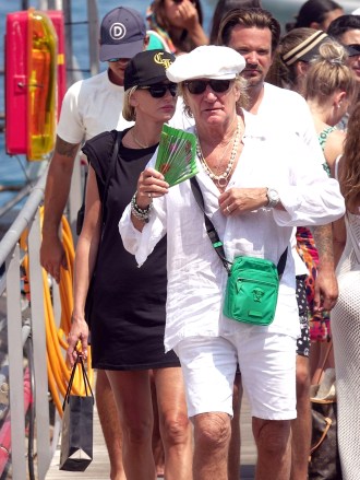 Capri, ITALY  - *EXCLUSIVE*  - Scottish rock and roll star Rod Stewart looks like a character out of 'Pirates of the Caribbean' as he's seen rocking some pearls while out with son Sean and daughter Kimberley on their holiday in Capri. **SHOT ON 08/06/22**Pictured: Rod Stewart, Sean Stewart, Kimberly StewartBACKGRID USA 9 AUGUST 2022 USA: +1 310 798 9111 / usasales@backgrid.comUK: +44 208 344 2007 / uksales@backgrid.com*UK Clients - Pictures Containing ChildrenPlease Pixelate Face Prior To Publication*