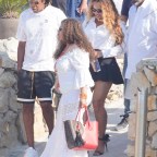 Jay-Z and Beyonce are seen leaving the La Guerite restaurant in Cannes