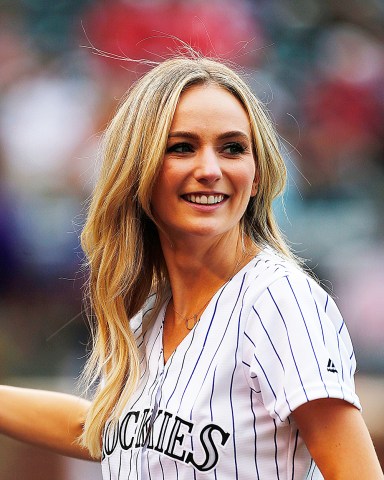 Lauren Bushnell Lauren Bushnell plays catch with her fiancÜBen Higgins from "The Bachelor" prior to baseball game between the Colorado Rockies and the Washington Nationals, in DenverColorado Rockies v Washington Nationals, MLB Baseball game, Denver, USA - 15 Aug 2016