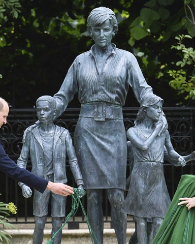 Britain's Prince William, left and Prince Harry unveil a statue they commissioned of their mother Princess Diana, on what woud have been her 60th birthday, in the Sunken Garden at Kensington Palace, London
Princess Diana, London, United Kingdom - 01 Jul 2021