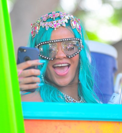 Rihanna was spotted partying hard at Cropover Festival Kadooment Day in Barbados . She looked amazing with a Blue Wig, and a Bejeweled Costume . She wore colorful feather headers as she waved to fans along the parade route. She seemed to be having an amazing time. Lewis Hamilton on the other hand, tried to get on the same float as his rumored ex, and she wanted no part. Him and his crew were forced to walk behind in the middle of the street.

Pictured: Rihanna,Lewis Hamilton,Rihanna
Lewis Hamilton
Ref: SPL1552165 070817 NON-EXCLUSIVE
Picture by: SplashNews.com

Splash News and Pictures
Los Angeles: 310-821-2666
New York: 212-619-2666
London: +44 (0)20 7644 7656
Berlin: +49 175 3764 166
photodesk@splashnews.com

World Rights