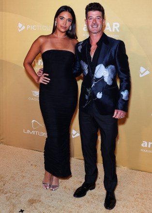 April Love Geary and Robin Thicke arrive at the 2022 amfAR Gala Los Angeles held at the Pacific Design Center on November 3, 2022 in West Hollywood, Los Angeles, California, United States.
2022 amfAR Gala Los Angeles, Pacific Design Center, West Hollywood, Los Angeles, California, United States - 03 Nov 2022