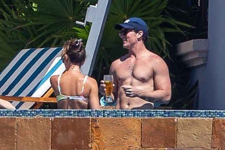 Cabo San Lucas, MEXICO - Miles Teller was spotted living it up amid his vacation to Mexico with his stunning wife, Keleigh Sperry, earlier on Thursday afternoon. The Top Gun: Maverick star, 35, was seen relaxing in the pool next to his other half, 29, as they sipped on a few delicious drinks. The happy couple were pictured sharing an affectionate hug as they lounged in the glistening, cool water with a few pals.Pictured: Miles Teller and Keleigh SperryBACKGRID USA 13 OCTOBER 2022 BYLINE MUST READ: HEM / BACKGRIDUSA: +1 310 798 9111 / usasales@backgrid.comUK: +44 208 344 2007 / uksales@backgrid.com*UK Clients - Pictures Containing ChildrenPlease Pixelate Face Prior To Publication*