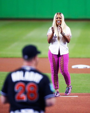 Rapper Trina reacts after throwing out a ceremonial first pitch before the start of a baseball game between the Miami Marlins and the Cincinnati Reds, in MiamiReds Marlins Baseball, Miami, USA - 21 Sep 2018