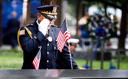 Sam Pulia, of Westchester, Ill., a former police officer, wipes a tear while looking at the name of his cousin, New York firefighter Thomas Anthony Casoria, at the South Pool of the 9/11 Memorial during ceremonies marking the 17th anniversary of the terrorist attacks in New York, New York, USA, 11 September 2018.
17th Anniversary of 9/11 terror attack in New York, USA - 11 Sep 2018