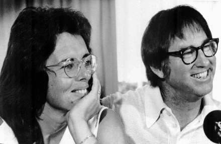 Billie Jean King and Bobby Riggs smile during a news conference in New York to publicize their upcoming match at the Houston Astrodome, July 11, 1973.  (AP Photo)