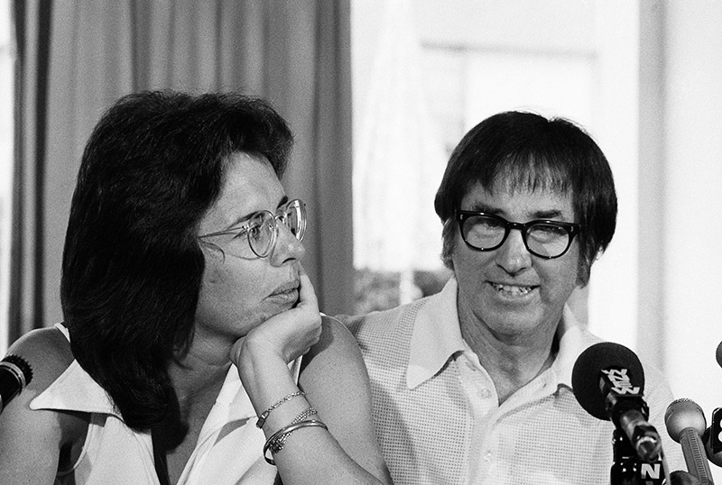 Billie Jean King, left, and Bobby Riggs smile during questioning at a New York conference Wednesday, July 11,1973. The two have agreed to meet in a $100,000 match.(AP Photo/AC)