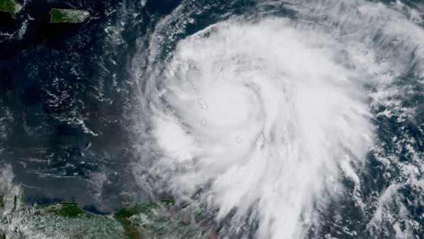HANDOUT EDITORIAL USE ONLY/NO SALES
Mandatory Credit: Photo by NOAA HANDOUT/EPA-EFE/REX/Shutterstock (9066620a)
A handout photo made available by the National Oceanic and Atmospheric Administration (NOAA) shows an image captured by NOAA's GOES-16 satellite of Hurricane Maria approaching the Leeward Islands, 18 September 2017. As of 11:00 am EDT, the category three storm was located about 60 miles east of Martinique and moving toward the west-northwest near 10 miles per hour. Forecasters with the National Hurricane Center say Maria, which has maximum sustained winds of near 120 miles per hour, is expected to be a 'dangerous major hurricane' as it moves through the Leeward Islands and the northeastern Caribbean Sea.
Hurricane Maria approaches the Caribbean, Atlantic Ocean, --- - 18 Sep 2017