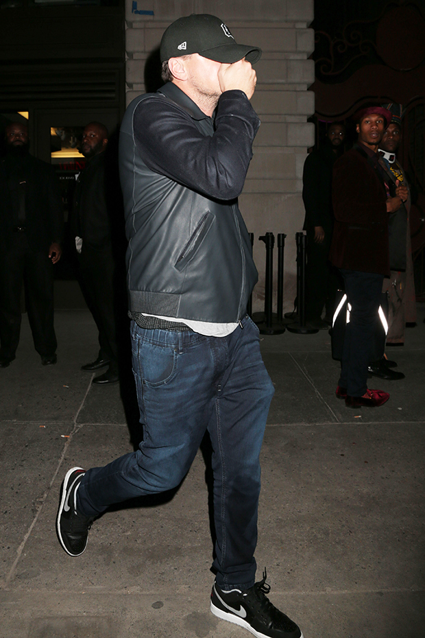 leonardo-dicaprio-caught-sneaking-into-rihanna_s-fashion-show-after-party-embed.jpg