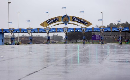 The entrance to the Magic Kingdom at Disney World is empty as the theme park was closed because of Hurricane Irma, in Lake Buena Vista, Fla. Other tourists attractions including Universal Studios and Sea World were also closed and planned to reopen TuesdayHurricane Irma Florida, Lake Buena Vista, USA - 10 Sep 2017
