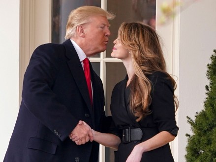 Donald Trump, Hope Hicks. President Donald Trump kisses White House communications director Hope Hicks on her last day before he boards Marine One on the South Lawn of the White House in Washington, for a short trip to Andrews Air Force Base, Md., and then on to Cleveland, Ohio
Trump, Washington, USA - 29 Mar 2018