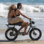 *EXCLUSIVE* Sofia Richie holds on tight to Scott Disick as they have some fun riding a motorbike on the beach!