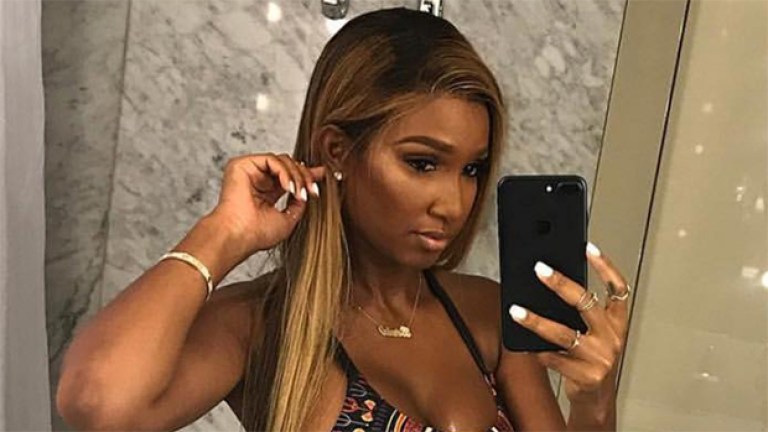 Bernice Burgos Rocks Bikini And Flashes Nipple On Nigerian Vacation