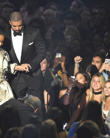 Rihanna, left, accepts the Michael Jackson Video Vanguard Award from Drake at the MTV Video Music Awards at Madison Square Garden, in New York
2016 MTV Video Music Awards - Show, New York, USA