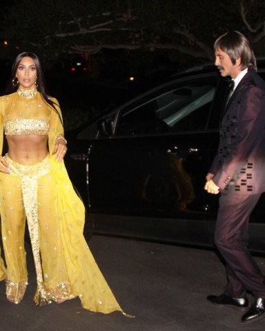 Kim Kardashian and Jonathan Cheban give the peace sign and smile as they depart to the Casa Amigos Halloween party in LA.Pictured: Kim Kardashian,Jonathan Cheban,Kim KardashianJonathan ChebanRef: SPL1609105 271017 NON-EXCLUSIVEPicture by: SplashNews.comSplash News and PicturesLos Angeles: 310-821-2666New York: 212-619-2666London: +44 (0)20 7644 7656Berlin: +49 175 3764 166photodesk@splashnews.comWorld Rights