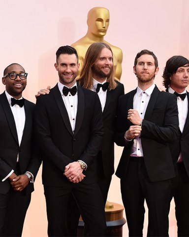 Mickey Madden, from left, PJ Morton, Adam Levine, James Valentine, Jesse Carmichael, Matt Flynn, and Sam Farrar of the musical group Maroon 5 arrive at the Oscars, at the Dolby Theatre in Los Angeles
87th Academy Awards - Arrivals, Los Angeles, USA