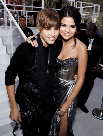 Justin Bieber, Selena Gomez Justin Bieber, left, and Selena Gomez arrive at the MTV Video Music Awards on in Los AngelesMTV Video Music Awards Arrivals, Los Angeles, USA