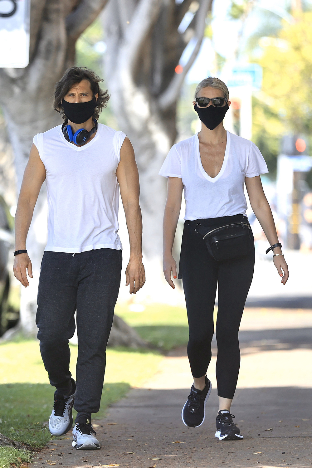 EXCLUSIVE: Gwyneth Paltrow and Brad Falchuk enjoy a Sunday stroll in the sunshine. The couple were wearing face masks as the took a break from quarantine amid the Los Angeles Covid-19 lockdown. 17 May 2020 Pictured: Gwyneth Paltrow, Brad Falchuk. Photo credit: Rachpoot/MEGA TheMegaAgency.com +1 888 505 6342 (Mega Agency TagID: MEGA666691_001.jpg) [Photo via Mega Agency]