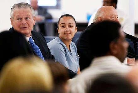 Cyntoia Brown, a woman serving a life sentence for killing a man when she was a 16-year-old prostitute, smiles at family members during her clemency hearing Wednesday, May 23, 2018, at Tennessee Prison for Women in Nashville, Tenn. It is her first bid for freedom before a parole board since the 2004 crime. (Lacy Atkins /The Tennessean via AP, Pool)
Cyntoia Brown Clemency Hearing, Nashville, USA - 23 May 2018