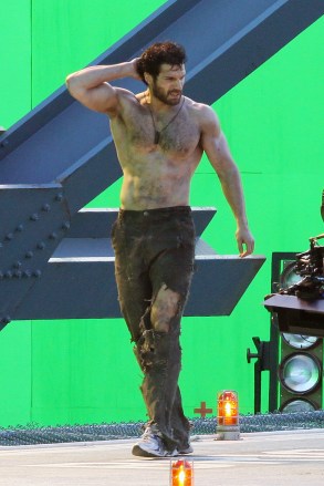 A shirtless Henry Cavill helps the coast guard on rescue mission on the set of Superman: Man of steel set in Vancouver. A rough & scruffy looking Henry Cavill films a green-screen scene where he helps rescue workers load into a helicopter. Pictured: Henry Cavill,Henry Cavillzach snyderRef: SPL326940 251011 NON-EXCLUSIVEPicture by: SplashNews.comSplash News and PicturesLos Angeles: 310-821-2666New York: 212-619-2666London: +44 (0)20 7644 7656Berlin: +49 175 3764 166photodesk@splashnews.comWorld Rights