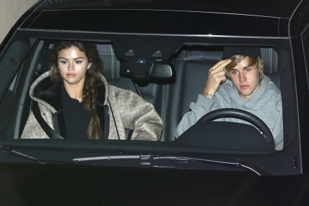 Beverly Hills, CA  - Superstar couple Selena Gomez and Justin Bieber were spotted hopping in their Range Rover together after their Wednesday evening church meeting in Beverly Hills.Pictured: Justin Bieber, Selena GomezBACKGRID USA 21 FEBRUARY 2018 USA: +1 310 798 9111 / usasales@backgrid.comUK: +44 208 344 2007 / uksales@backgrid.com*UK Clients - Pictures Containing ChildrenPlease Pixelate Face Prior To Publication*