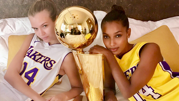 Models Pose With Larry O’brien Championship Trophy In Nba