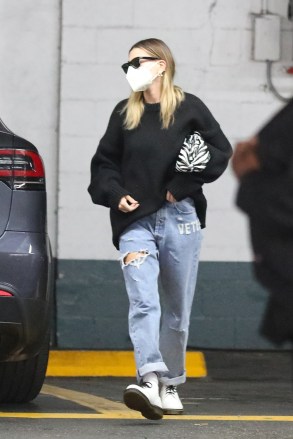 Beverly Hills, CA  - *EXCLUSIVE*  - Justin Bieber and wifey Hailey Bieber hold hands as they hop out of their new Tesla X to run a few errands in Beverly Hills.Pictured: Hailey BieberBACKGRID USA 1 FEBRUARY 2021 BYLINE MUST READ: SPOT / BACKGRIDUSA: +1 310 798 9111 / usasales@backgrid.comUK: +44 208 344 2007 / uksales@backgrid.com*UK Clients - Pictures Containing ChildrenPlease Pixelate Face Prior To Publication*