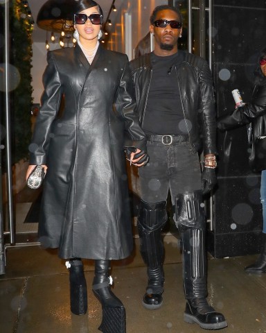 *EXCLUSIVE* New York, NY  - Cardi B & Offset steps out looking like the Matrix in black leather outfits. Cardi towers in Chanel platform shoes and nearly took a spill but was saved by Offset.  Pictured: Cardi B & Offset  BACKGRID USA 30 APRIL 2023   USA: +1 310 798 9111 / usasales@backgrid.com  UK: +44 208 344 2007 / uksales@backgrid.com  *UK Clients - Pictures Containing Children Please Pixelate Face Prior To Publication*