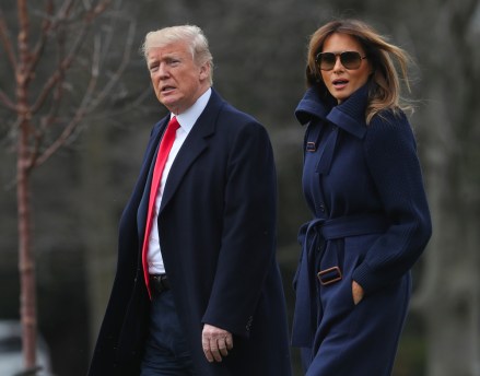 Donald Trump, Melania Trump. President Donald Trump and first lady Melania Trump walk across the South Lawn of the White House in Washington, before boarding Marine One helicopter for the short trip to Andrews Air Force Base, Md. Trump is traveling to Manchester, NH., to announced his plan to combat opioid drug addiction
Trump, Washington, USA - 19 Mar 2018