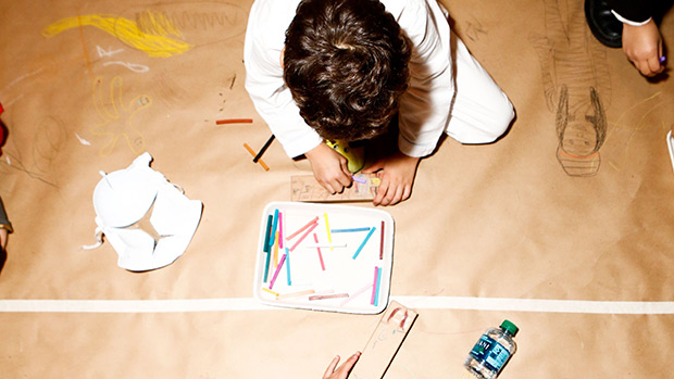 two kids drawing