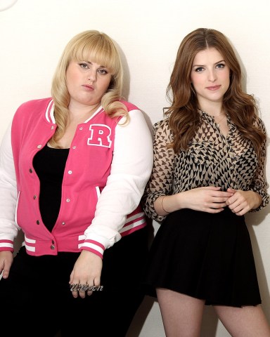 FILE - This Sept. 21, 2012 file photo shows actors Rebel Wilson, left, and Anna Kendrick, from the film "Pitch Perfect", posing in West Hollywood, Calif. Since its release in Sept. 2012, “Pitch Perfect: Original Motion Picture Soundtrack” has peaked at No. 3 on Billboard’s 200 albums chart and has sold more than 700,000 units, according to Nielsen SoundScan. Kendrick’s “Cup” is certified platinum and is a Top 30 hit on the Billboard Hot 100 chart. (Photo by Matt Sayles/Invision/AP, file)