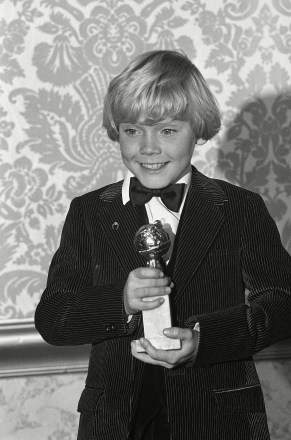 Child actor Ricky Schroder clutches his award presented him for New Male Star of the Year in a Motion Picture during ceremonies at the Hollywood Foreign Press Associations 1980 Golden Awards show Saturday night, in Los Angeles. Schroder won for his part in the movie in the "The Champ
Golden Globes 1980, Los Angeles, USA