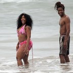 EXCLUSIVE: ** WARNING: Contains Nudity ** Singer SZA is all smiles at the beach in Hawaii as she celebrates chart-topping success with long-awaited new album 'SOS'