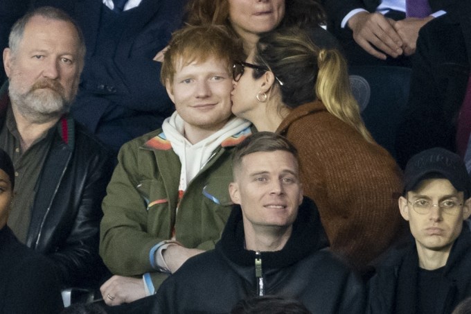 Ed Sheeran and Cherry Seaborn at a soccer game