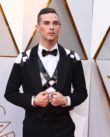 Adam Rippon arrives at the Oscars on Sunday, March 4, 2018, at the Dolby Theatre in Los Angeles. (Photo by Jordan Strauss/Invision/AP)