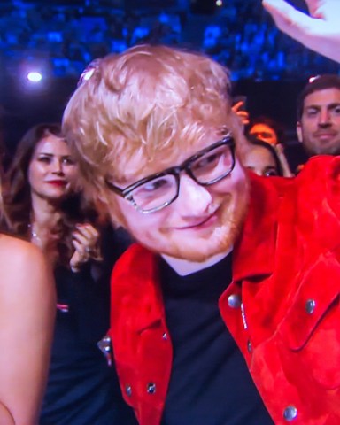Video grab of Ed Sheeran and his girlfriend Cherry Seaborn at the Brit Awards on Feb 21st.Pop star Ed Sheeran has revealed that his fiancee MADE an engagement ring for him, after responding to rumours that he secretly tied the knot.The Shape of You singer, who was spotted wearing a silver band on his wedding finger at a gig earlier this week, said his childhood sweetheart, Cherry Seaborn, made the ring for him out of silver plate.The 27-year-old, whose interview on the red carpet at the BRIT Awards was shown on ITV's Lorraine this morning, said: "It's the same commitment either way, so Cherry made it for me out of silver plate and I really like it. I haven't told anyone else about it yet."* No UK Papers Or Web * Magazines Only / Worldwide RightsPictured: Cherry Seaborn,Ed SheeranRef: SPL4188722 240218 NON-EXCLUSIVEPicture by: Flynet - SplashNews / SplashNews.comSplash News and PicturesUSA: +1 310-525-5808London: +44 (0)20 8126 1009Berlin: +49 175 3764 166photodesk@splashnews.comWorld Rights