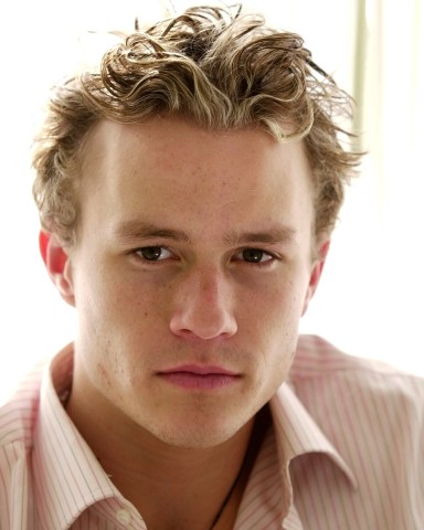 Australian actor Heath Ledger poses at the Four Seasons Hotel in Beverly Hills, Calif., March 31, 2001. Ledger, 22, who appeared as Mel Gibson's battle-hungry son in "The Patriot," will be seen in Columbia Pictures upcoming film "A Knight's Tale." The film is about a squire who masquerades as a knight so he can compete in tournaments, aided by a ragtag pit crew that includes an out-of-work scribe named Geoffrey Chaucer. (AP Photo/Michael Caulfield)