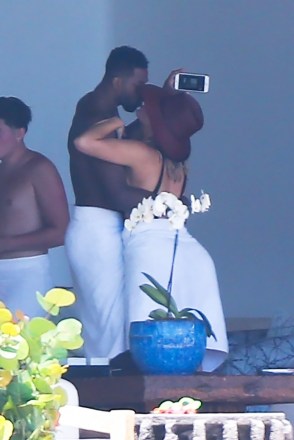Puerto Vallarta, MEXICO  - Kendall Jenner, Khloe Kardashian, and their beaus, NBA players Ben Simmons and Tristan Thompson continue their tropical Puerto Vallarta getaway with friends. Khloe and Tristan packed on the PDA in their private pool while friends looked on, while Kendall and the rest of group collectively flipped the bird, although it's not sure whether that was directed at Kendall's beau Ben Simmons, or the photographers in the distance.

Pictured: Khloe Kardashian and Tristan Thompson

BACKGRID USA 12 AUGUST 2018 

USA: +1 310 798 9111 / usasales@backgrid.com

UK: +44 208 344 2007 / uksales@backgrid.com

*UK Clients - Pictures Containing Children
Please Pixelate Face Prior To Publication*
