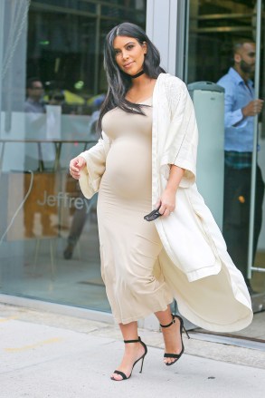 Kim Kardashian smiles as showing her belly bump while leaving Jeffrey store in Meatpacking District in New York City, kim was shopping with her sister Kylie Jenner after their have lunch at Serafina Restaurant on Sep 13, 2015 

Pictured: Kim Kardashian
Ref: SPL1125121  130915  
Picture by: Felipe Ramales / Splash News

Splash News and Pictures
Los Angeles:310-821-2666
New York:212-619-2666
London:870-934-2666
photodesk@splashnews.com