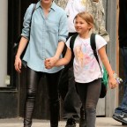 Actress Michelle Williams walks with her daughter Matilda Ledger in Brooklyn on October 16, 2013