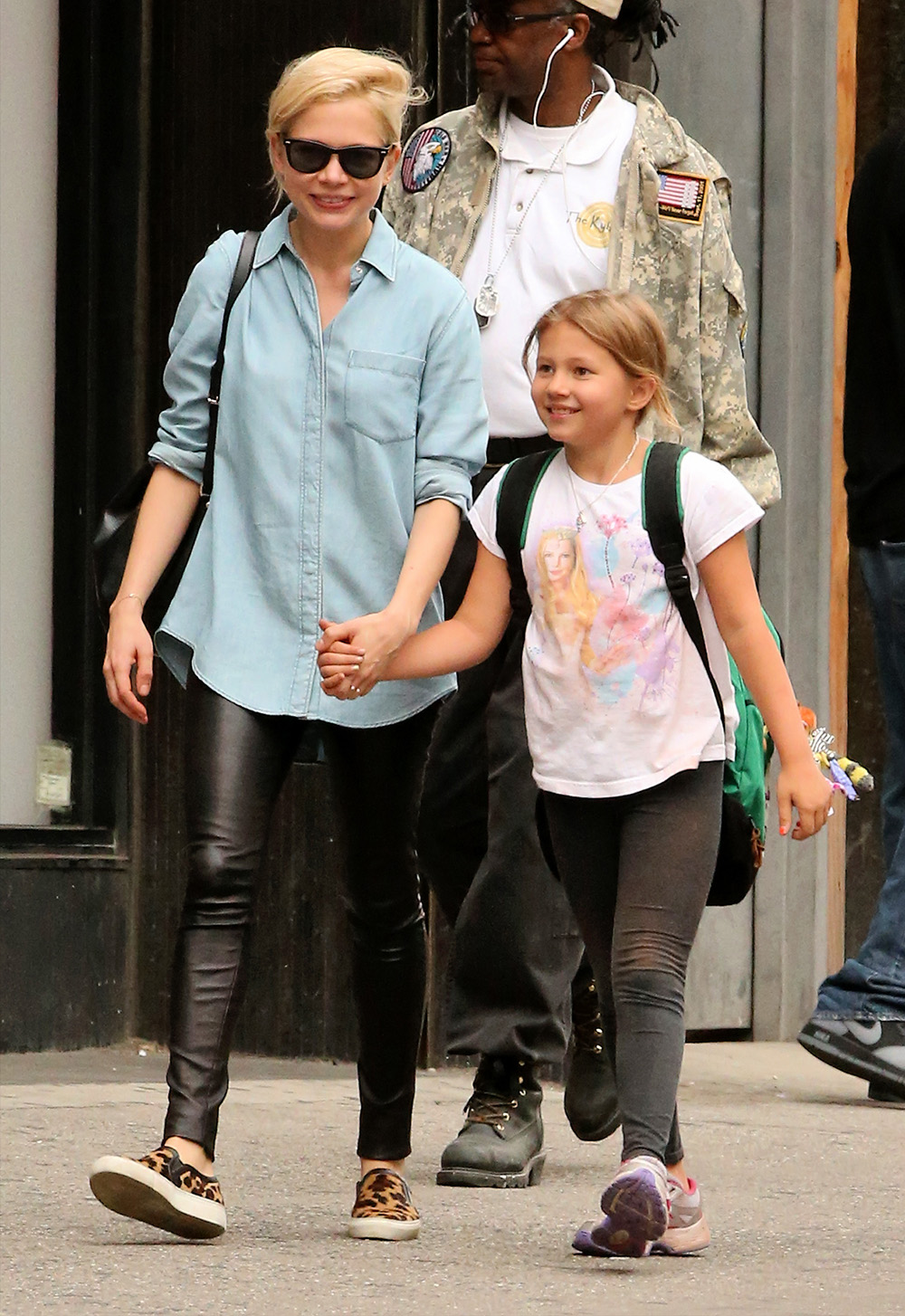 Actress Michelle Williams walks with her daughter Matilda Ledger in Brooklyn on October 16, 2013