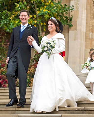 Princess Eugenie baby. File photo dated 12/10/18 of Princess Eugenie and Jack Brooksbank on their wedding day. Buckingham Palace said that the couple are "very pleased" to announce that they are expecting a baby in early 2021. Issue date: Friday October 12, 2018. It was announced in a tweet by the Royal Family account, which added: "The Duke of York and Sarah, Duchess of York, Mr and Mrs George Brooksbank, The Queen and The Duke of Edinburgh are delighted with the news". See PA story ROYAL Eugenie. Photo credit should read: Victoria Jones/PA Wire URN:55694897 (Press Association via AP Images)