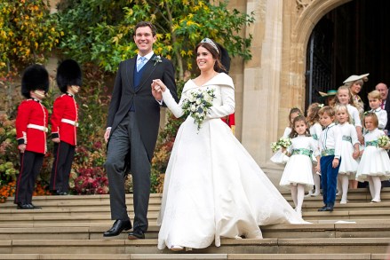 Princess Eugenie baby. File photo dated 12/10/18 of Princess Eugenie and Jack Brooksbank on their wedding day. Buckingham Palace said that the couple are "very pleased" to announce that they are expecting a baby in early 2021. Issue date: Friday October 12, 2018. It was announced in a tweet by the Royal Family account, which added: "The Duke of York and Sarah, Duchess of York, Mr and Mrs George Brooksbank, The Queen and The Duke of Edinburgh are delighted with the news". See PA story ROYAL Eugenie. Photo credit should read: Victoria Jones/PA Wire URN:55694897 (Press Association via AP Images)