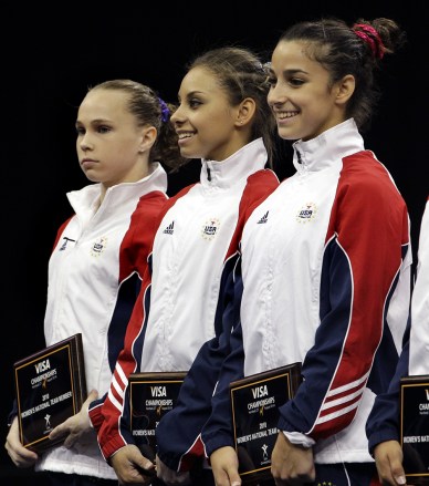 Rebecca Bross, Mattie Larson, Alexandra Raisman From left to right, gold medalist Rebecca Bross, silver medalist Mattie Larson, and bronze medalist Alexandra Raisman of the all-around in the women's senior division, stand before the crowd at the U.S. Gymnastics Championships in Hartford, Conn
US Gymnastics Championships, Hartford, USA