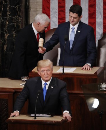 Donald J. Trump
US President Donald J. Trump delivers his State of the Union to Congress, Washington, USA - 30 Jan 2018
US President Donald J. Trump arrives to deliver his first State of the Union from the floor of the House of Representatives in Washington, DC, USA, 30 January 2018.  At rear are US Vice President Mike Pence (L) and Speaker of the House Paul Ryan.