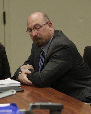 POOL PHOTO; MANDATORY CREDIT.Mandatory Credit: Photo by GINA FERAZZI/POOL/EPA-EFE/REX/Shutterstock (9325684h)Louise Turpin (L) and attorney Jeff Moore (C) David Turpin (R) appear in court for arraignment on charges against the two in relation to their 13 malnourished children found chained in their home in Riverside, California, USA, 18 January 2018. The two parents were charged with multiple counts of Child abuse, torture, abuse of dependent adults and false imprisonment and could face close to 100 years to life in prison if convicted.Charges filed in case of 13 siblings found in Perris, California home, Riverside, USA - 18 Jan 2018
